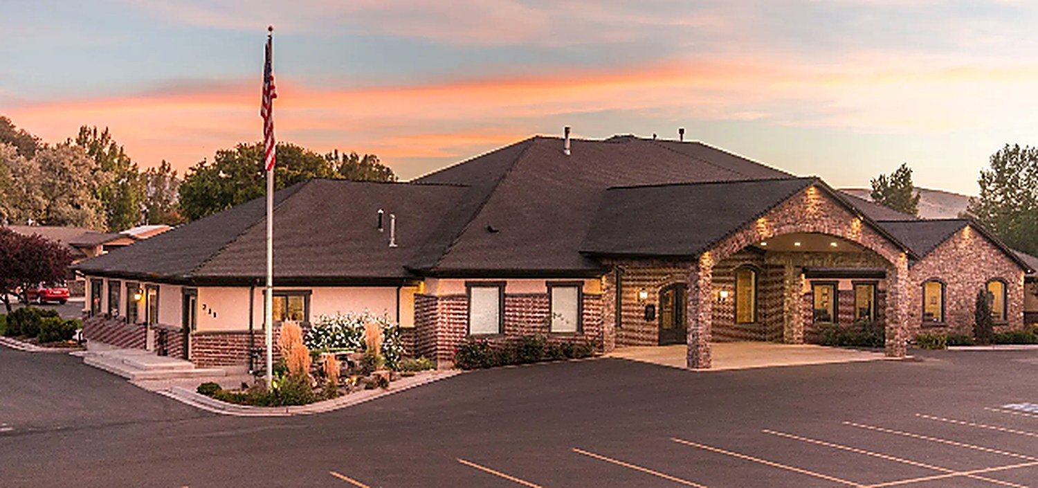 Wilks Funeral Home on Chubbuck Road in Chubbuck, Idaho, lit at dusk